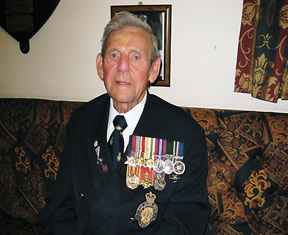 Ken Blake with his medals